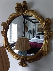 Carved wood, gilt wall mirror. 