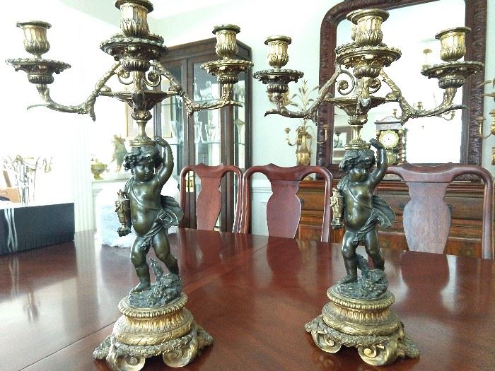 Pair of wonderful vintage French bronze candlesticks, with putti. 