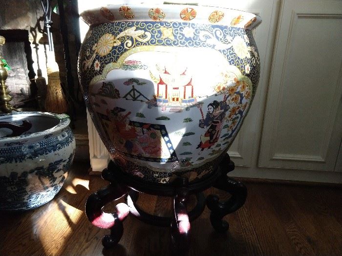Large Asian porcelain fishbowl on mahogany stand. 