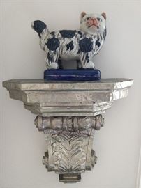 One of a pair of hammered tin/mahogany wall sconces, with Staffordshire-style fat cat.