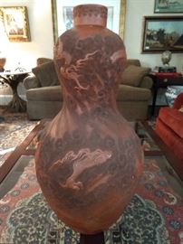 28" tall red clay Asian urn, with dragon detail in relief. 
