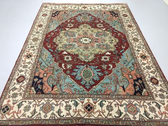 Lovely hand woven room sized Persian design Heriz rug, 100% wool face, measures 9' x 12'.