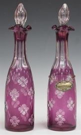 LOT #5240 - PAIR OF AMETHYST CUT TO CLEAR BOTTLES, 19TH C.