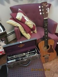 Clarinet made in Paris, and Guitar  are both is good condition.