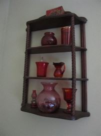 Wall shelving with cranberry, ruby stain and cut to clear ruby glass. 