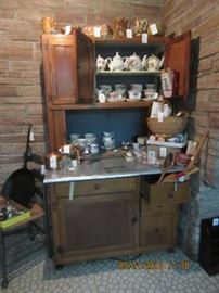 Hoosier cabinet with tin top, folding doors and in good condition