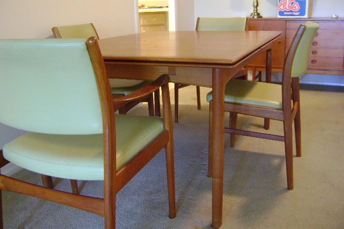 4 mid-century teak side chairs and 2 arm chairs.