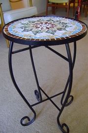 Cast iron mosaic plant stand is 23 inches tall.