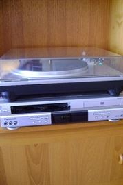 Onkyo turntable and below is a Panasonic VHS-DVD player.