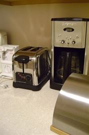 Small appliances...toaster and can opener and bread box and coffee maker.  