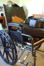 Wheel chair has rarely been used and is in perfect condition.