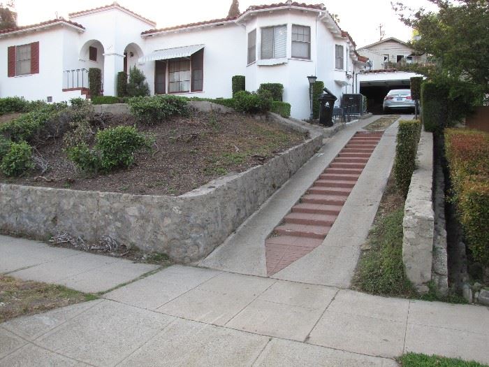 You should know there is a steep driveway leading to the front door.  