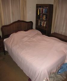 This full-sized bedframe is available, as is the bookcase in the corner.  