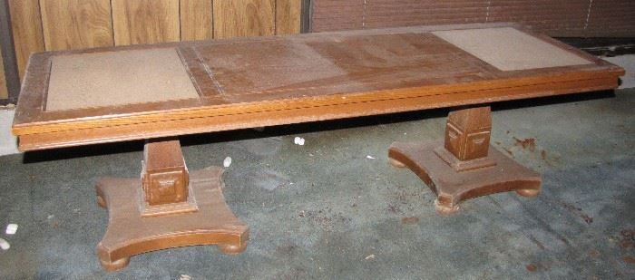 This coffee table has two "inlaid" tiles sitting in the top.  It also needs dusting and some TLC.