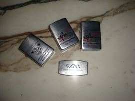 Zippo items include pocket knife(bottom) and three lighters. One on left is 1943-45,  other two are 1958