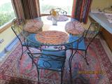 5 piece rod iron table and chairs from the 1920s