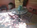7 piece rod iron table and chairs