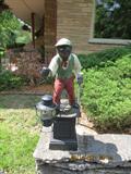 Jockey concrete with a metal base lantern electrified in working condition