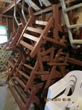 Red wood furniture numberous pieces, lawn chairs, tables, chairs and benches