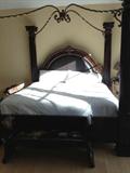 King size canopy bed with walnut and leather upholstered headboard