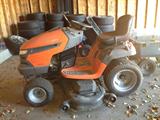 Huskavana riding mower and attachable wagon