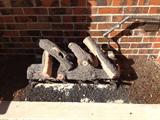 Ceramic logs for a gas fireplace, there are three sets.