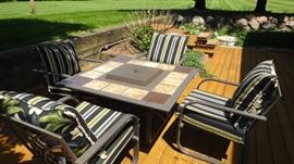 Fire pit table, 4 matching chairs with cushions