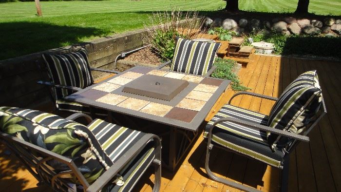 Fire pit table, 4 matching chairs with cushions