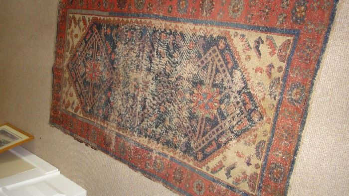 Antique hand knitted rug