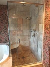 1" thick glass shower enclosure Front w/ door 43" W, 78" H, side 48 W, 63" H. Glass side wall is short, ending at tub top. $150.00 Brushed nickel Moen shower system with rain, hand held and side shower. $200.00