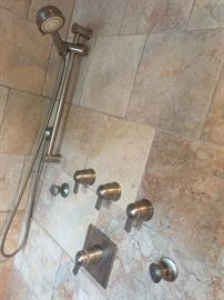 Brushed nickel Moen shower system with rain, hand held and side shower. $200.00