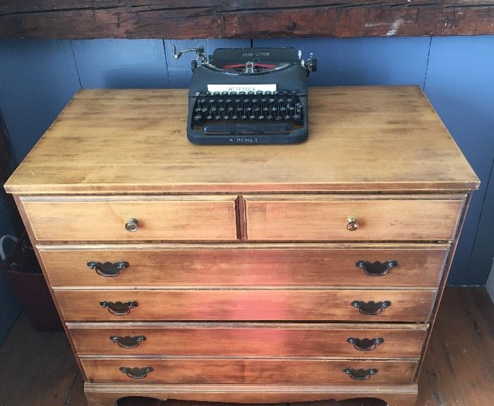 Sixty-year-old bureau.  This one is refinished.  There is a matching one that's unfinished that we are selling as well. 