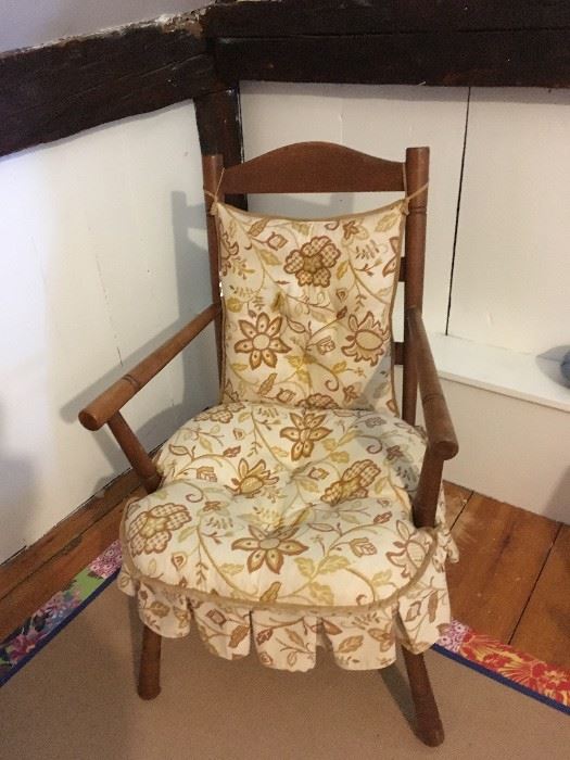 Vintage upholstered chair.  Rug below is for sale as well.  