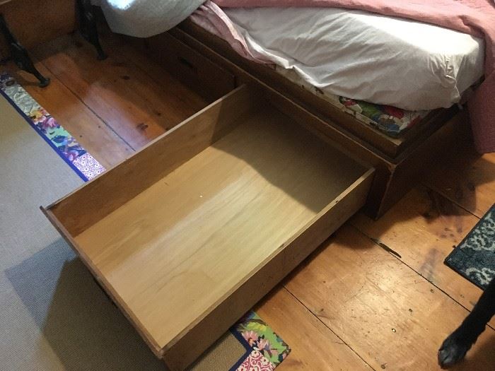 Twin captain's bed.  This twin has three huge drawers underneath which makes for excellent storage.  Rug shown in photo for sale as well.  