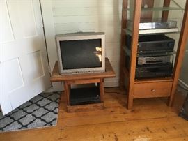 Old TV (still in working condition), This End Up end table, and media center are all for sale. The electronics on the media center are for sale also.
