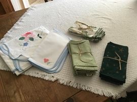 New Italian cloth tablecloth and napkins, and assorted cloth napkin sets. Other linens will also be for sale.