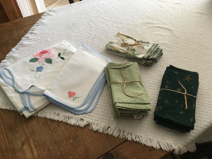 New Italian cloth tablecloth and napkins, and assorted cloth napkin sets. Other linens will also be for sale.