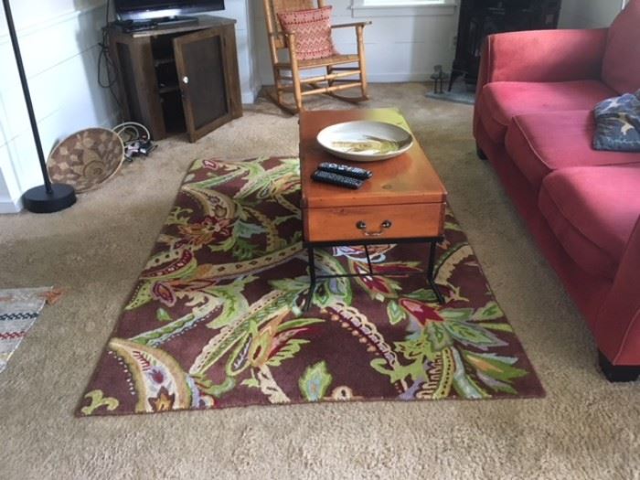 Beautiful Company C rug for sale! In this photo, couch, rocker, and pie safe are also for sale.  The coffee table is for sale, the African basket and pottery are not for sale. 