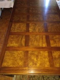 Beautiful table, very well cared for. Comes with table pads.  American of Martinville circa 1970's in pristine condition. Comes with 8 side chairs and 2 arm chairs. 118" x 46" with 2 leaves.  74" x 46" w/o leaves
