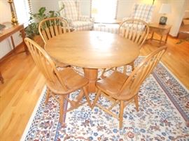 48" inch round pedestal table with 4 matching chairs