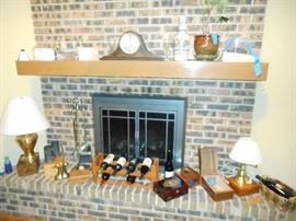mantel clock, cigar boxes , red wine