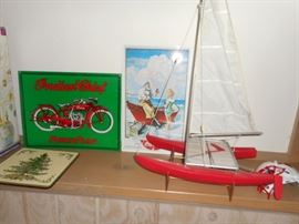 Tin advertisizing  signage and scale model boat