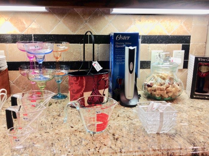 More Kitchen.  Oster Rechargeable Wine Cork Remover
