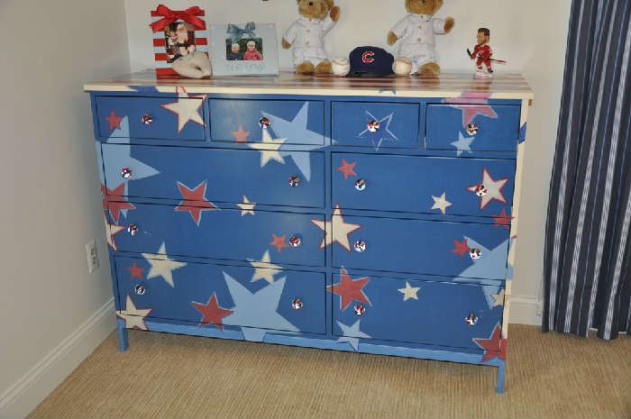 All-American, Star Spangled custom-painted Room & Board dresser; 60" x 20" x 42"; 10 drawers; maple wood painted with steel framing; custom star drawer pulls; available for $600!