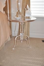 Acrylic side table from Wisteria; 22" diameter x 16" height; very hip and chic; originally paid $700; take it home for $350.