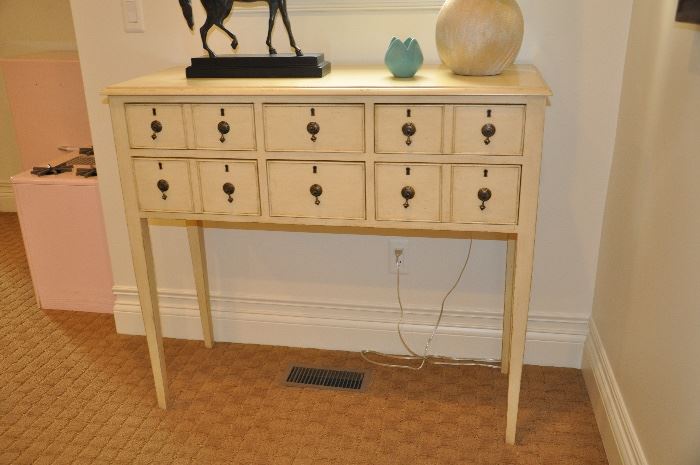 Somerset Bay console table cream-colored with beautiful bronze hardware; originally purchased from Gorman's for $1,800 after the decorator discount; take it home for $900.