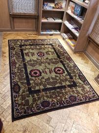Plum and olive wool rug purchased new from Hagopian; 5' x 7.5'; originally $2360; available for $1200.