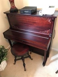 1931 Ricca & Son 66 key cocktail piano $ 300.00.  Antique stool $ 70.00