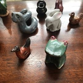 Part of the collection of miniature pottery animals. Love the frog.