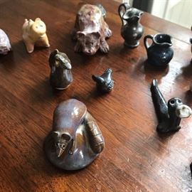 More animals with some miniature pitchers.
